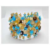 Wide woven handcrafted turquoise and amber beaded bracelet.