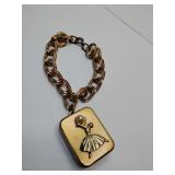 Rare Swiss Made charm bracelet that is a music box, 1" x 1 1/2" works/plays.