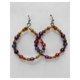 Handmade beaded earth tone hoop earrings featuring colorful glass or gemstone beads. Also the matching bracelet that is broken.
