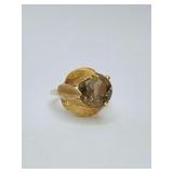 Vintage cocktail ring featuring a round, faceted smoky quartz gemstone set in textured 14k yellow gold. Size 4.5. Weighs 4 grams