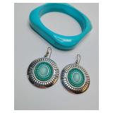Turquoise concho dangle earrings and a vintage turquoise blue plastic bangle features a distinct geometric, vintage turquoise blue plastic bangle features a distinct geometric, square shape with round