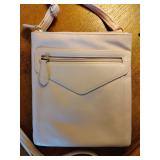 Safe Keeper Blush Pink Crossbody Bag With Multiple Zip Pockets, 7 1/4" x 8 1/2", adjustable strap. Very soft.