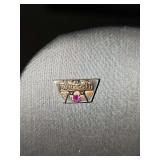 10K gold 'WILSON' lapel pin with red stone. Weight 1.71 grams
