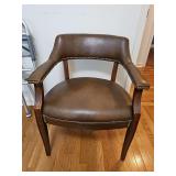 Leather look side chair with nail head trim. 24x20x29.5 in tall. Seat height 18 in. (Matches #52-not included.)