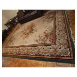 Mohawk area rug. 120 x 156 in. Pattern is Kelmscott light camel. Includes pad. Needs cleaned.