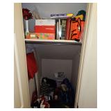 Contents of hall closet as shown.