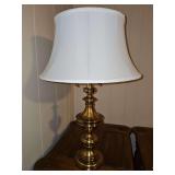 Heavy brass lamp with individual dual bulbs. 30.5 in tall.