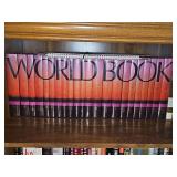 Shelf of books. World book 2001 complete set plus a science year 1978 edition.