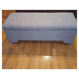 Heather grey upholstered storage chest. 45 x17 x17 in tall. Includes a super soft chenille coverlet and floral coverlet with butterflies.