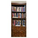 Vintage two-door, three shelf bookcase. 28x15x72 in tall. Contents are NOT included.
