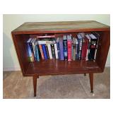 MCM bookcase. 28 x14.25 x27.5 in tall. Includes books as shown.