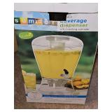 Beverage dispenser with cooling cylinder. Great for the upcoming summer parties.