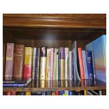 Shelf of books as shown.