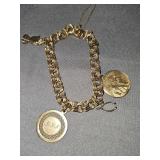 Gold filled 7 in charm bracelet with Gemini gold filled charm. Other three charms are not marked. Weight is 25.05 g.