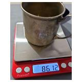 Sterling baby cup engraved "JOAN 1939". Weighs 86.12 grams.