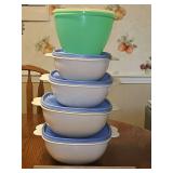 Tupperware bowls with lids.