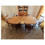 Dining table with two 9.75 in leafs. With leafs inserted as shown, 79 x 41.5 x 29 in tall. 6 Windsor fiddleback chairs. Two are arm chairs. Chairs are 17.75 x 19.75 x 35 in tall. Seat height is 16.5 i