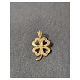 14 karat gold four-leaf clover charm or pendant. Wait 0.71 grams
