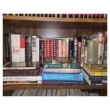 Shelf of books as shown. Primarily cookbooks.