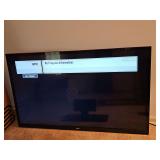LG 55LS4500 55 in. flat screen TV with remote. Power's on. Includes stand. No wall mount.
