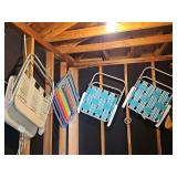 Grouping of lawn chairs and a beach chair.