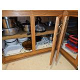 Contents of three lower cabinets as shown.