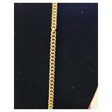 12K gold filled watch fob. 12 in long. 22.66 grams.  Has a kink.