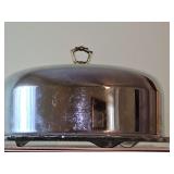 Vintage collectable Kromex cake cover with footed cake plate.