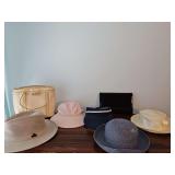 Sun hats and two purses. See all photos.