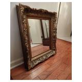 Vintage gold gilt very decoratively framed mirror