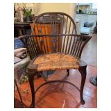 Antique Windsor-style hoop back armchair with a woven rush seat and cabriole legs (seating has blemishes)