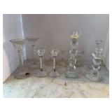 Grouping of 10 crystal and clear glass candlesticks - some are unmarked - others are Noritake, Mikasa, Oleg Cassini