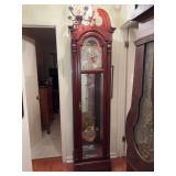 Stunning Howard Miller Grandfather Clock (model 610-973) with key - 20-1/2 x 12 x approx. 86 tall to top of finial