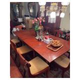 Research indicates that this is a H. Willett Company dining room gate leg table with (1) captain’s chair and (7) side chairs