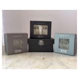 Grouping of signed  Oleg Cassini crystal votive candle holders in various shapes and sizes (all are smaller in size) and set of crystal perfume bottles - all in original boxes