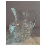 American Brilliant Period cut glass water pitcher featuring intricate hobstar and fan motifs - 8-1/2” tall