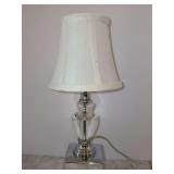 Very cute and dainty silver toned base table lamp with glass urn-style center - 13” tall and shade needs cleaned