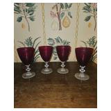 Ruby red glass wine goblets with a clear, decorative stem. (Set of 4)