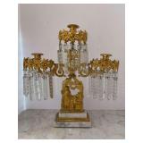 19th-century Victorian girandole candelabra, featuring ornate gilt bronze or brass construction with hanging crystal prisms mounted on a white marble base - 17-1/4”w x 17-1/4” tall