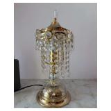 Beautiful Vintage gold-toned chandelier-style table lamp with crystal teardrop prisms and a glass base - 15-1/4” tall