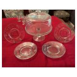 Glass covered cake plate with 6- 8 inch etched dessert plates