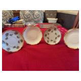 Set of four porcelain saucers