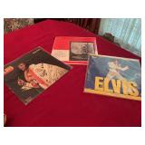 Three albums, two Elvis albums, and a Christmas melodies album