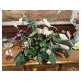 Magnolia flower arrangement in metal footed vase 33 inches by 23 inches 18 inches tall