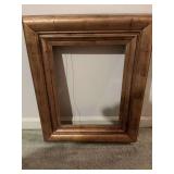 Gold picture frame measuring 20” x 24 1/2”