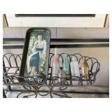 Coca cola tray , thermometer, and bottle opener with a group of bottles