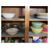 Contents of upper two shelves of double cabinet as shown
