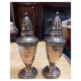 Sterling silver salt and pepper shakers see photos for condition. 156 grams weighted
