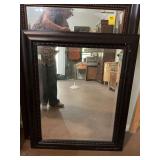 Black beveled glass mirror 29” x 35” slight scratching on one corner