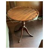 Vintage four legged brass footed table